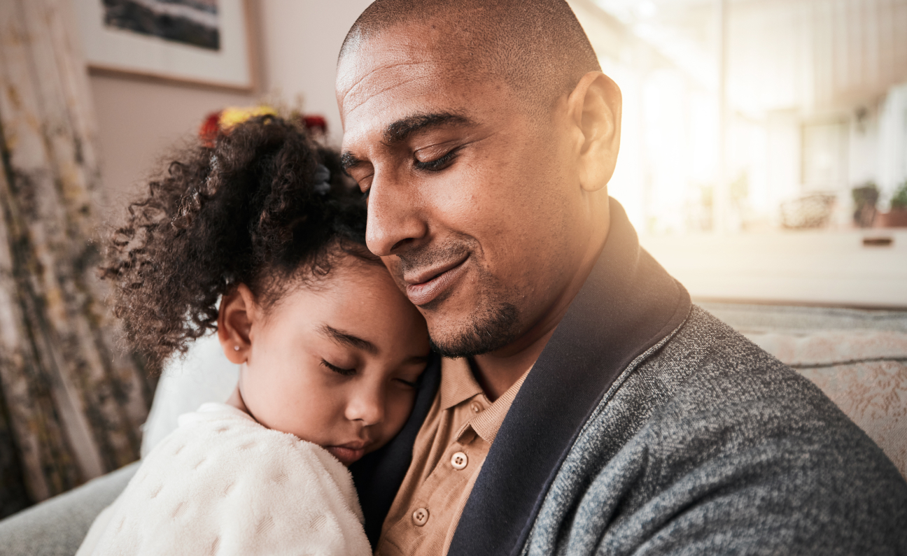 Father holding daughter in loving embrace - communicating Family Law services at Yarn Legal